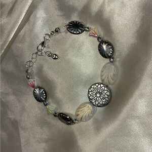 Hand Crafted Silver and White Bracelet with Floral Accents